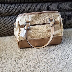 M.C. leather cream and brown crossbody bag